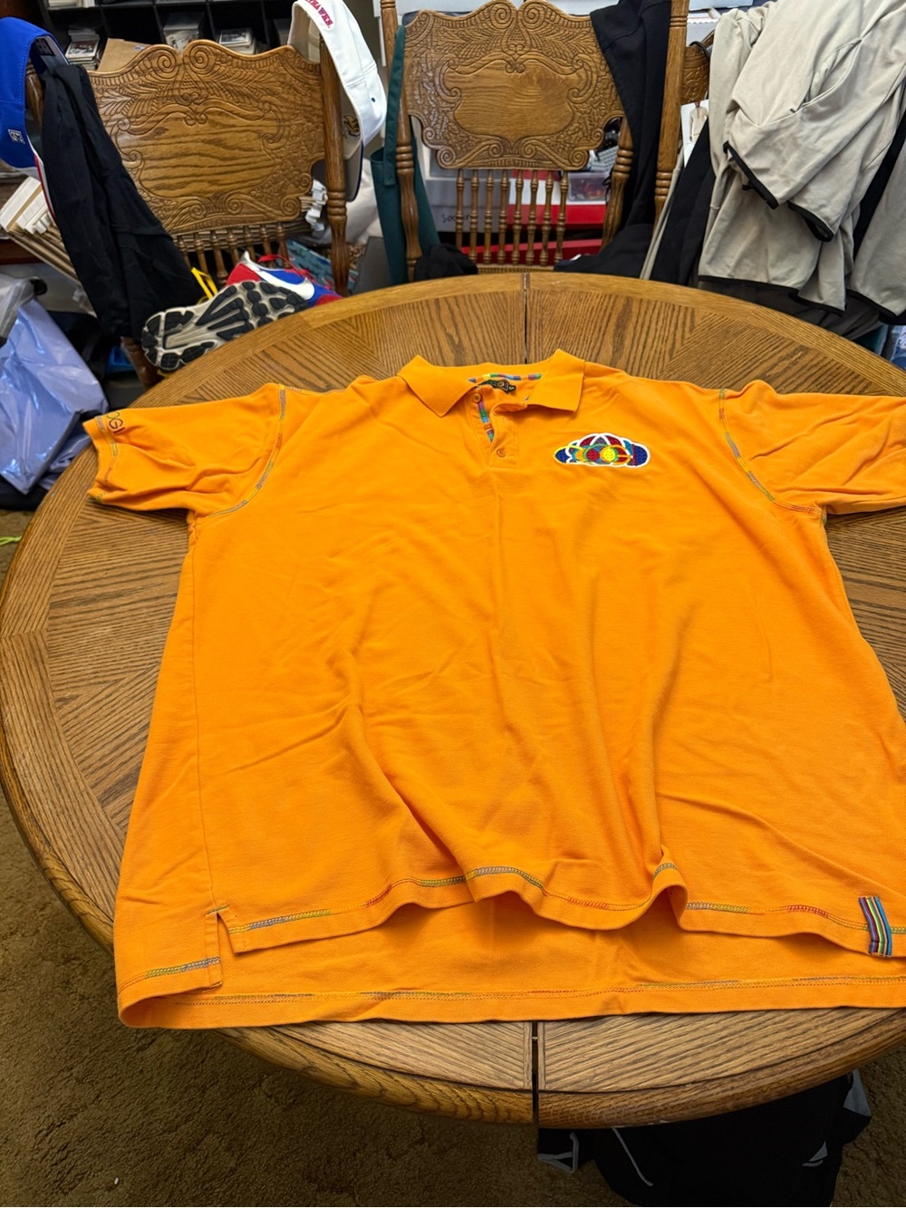 COOGI Orange Polo with Multicolor Emblem